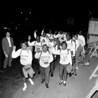night photo of Brooklyn CORE members walking to March on Washington