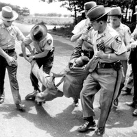 photo of Long Island CORE chairman Lincoln Lynch being arrested