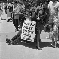 photo of Long Island CORE member being arrested 